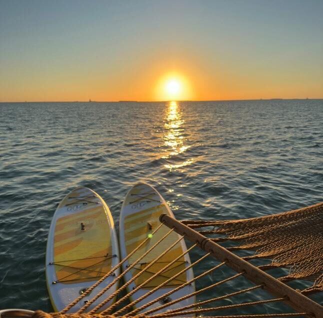 Tiki Suites Key West beautiful sunset while glamping in the Atlantic Ocean